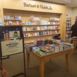 Barnes & Noble bookstore display featuring books and a sign for virtual author events.