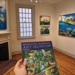 Art museum interior with paintings and a Princeton University Art Museum magazine.
