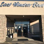 East Windsor Bowl entrance with stone pillars and large signage.