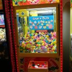Toy Soldier arcade game featuring a "Grab-a-Duck" prize redemption area.