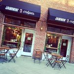 Jammin' Crêpes storefront with outdoor seating on a brick sidewalk.