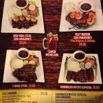 Menu featuring steak dishes like New York Steak, Filet Mignon, and Churrasco Mystic Especial.