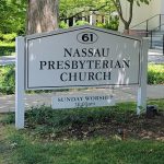 Sign for Nassau Presbyterian Church with address 61 and Sunday worship time.