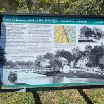 Historical sign detailing Port Mercer and the Bridge Tender's House in Canal State Park.