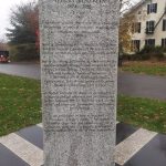 Granite memorial stone dedicated to Albert Einstein, listing his birth and death years.