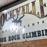 Rockyville Climbing Center sign advertising indoor rock climbing.