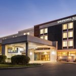 Springhill Suites by Marriott hotel entrance at twilight with modern architecture.